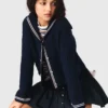 Cardigan à col bateau en maille torsadée