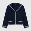 Cardigan à col bateau en maille torsadée