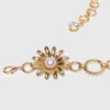 Ceinture à chaîne avec fleurs
