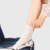 Chaussettes en pointelle perlé Chaussettes en pointelle perlé