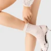 Chaussettes en pointelle perlé Chaussettes en pointelle perlé