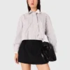 Chemise à strass avec cravate amovible Chemise à strass avec cravate amovible