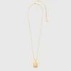 Collier avec plaque représentant le signe du zodiaque