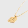 Collier avec plaque représentant le signe du zodiaque
