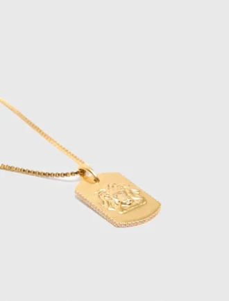 Collier avec plaque représentant le signe du zodiaque