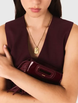 Collier avec plaque représentant le signe du zodiaque