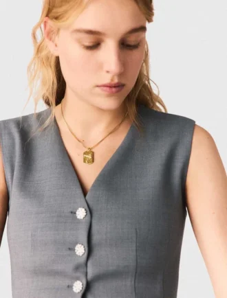 Collier avec plaque représentant le signe du zodiaque
