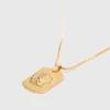Collier avec plaque représentant le signe du zodiaque