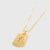 Collier avec plaque représentant le signe du zodiaque