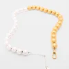 Collier de perles bicolore Collier de perles bicolore