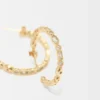 Grandes boucles d’oreilles créoles ornées de strass Grandes boucles d’oreilles créoles ornées de strass