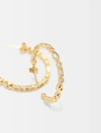 Grandes boucles d&rsquo;oreilles créoles ornées de strass