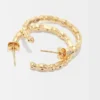 Grandes boucles d’oreilles créoles ornées de strass Grandes boucles d’oreilles créoles ornées de strass