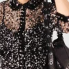 Haut à paillettes florales
