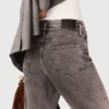 Jean à jambes larges avec ceinture à maillons Jean à jambes larges avec ceinture à maillons