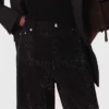 Jean à jambes larges avec strass Jean à jambes larges avec strass