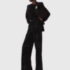 Jean à jambes larges avec strass Jean à jambes larges avec strass
