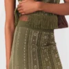 Jupe en maille avec fleurs en strass