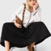 Jupe longue avec ceinture contrastée Jupe longue avec ceinture contrastée