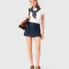 Jupe-short en denim brodée à effet superposé Jupe-short en denim brodée à effet superposé