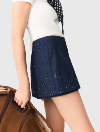 Jupe-short en denim brodée à effet superposé