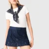 Jupe-short en denim brodée à effet superposé Jupe-short en denim brodée à effet superposé