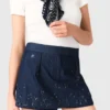 Jupe-short en denim brodée à effet superposé Jupe-short en denim brodée à effet superposé