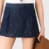 Jupe-short en denim brodée à effet superposé Jupe-short en denim brodée à effet superposé