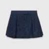 Jupe-short en denim brodée à effet superposé Jupe-short en denim brodée à effet superposé