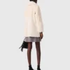 Long manteau en fausse fourrure Long manteau en fausse fourrure