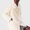 Long manteau en fausse fourrure Long manteau en fausse fourrure