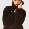 Manteau court bouclé Manteau court bouclé