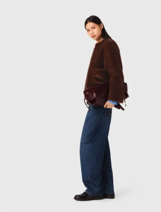Manteau court en fausse fourrure