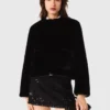 Manteau court en fausse fourrure Manteau court en fausse fourrure