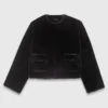 Manteau court en fausse fourrure Manteau court en fausse fourrure
