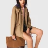 Manteau en laine avec capuche amovible Manteau en laine avec capuche amovible