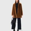 Manteau mi-long en fausse fourrure