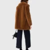Manteau mi-long en fausse fourrure