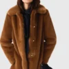 Manteau mi-long en fausse fourrure