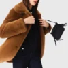 Manteau mi-long en fausse fourrure