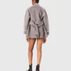 Manteau réversible avec bordures Manteau réversible avec bordures