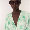 Mini-robe plissée à motifs