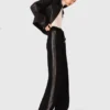 Pantalon avec bande en strass Pantalon avec bande en strass