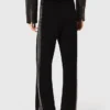 Pantalon avec bande en strass Pantalon avec bande en strass