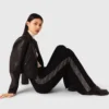 Pantalon avec bande en strass Pantalon avec bande en strass
