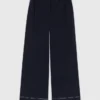 Pantalon en coton avec ceinture en cuir
