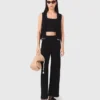 Pantalon en maille ornée de bijoux