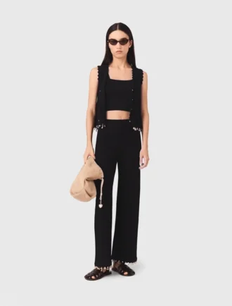 Pantalon en maille ornée de bijoux