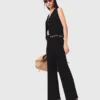 Pantalon en maille ornée de bijoux