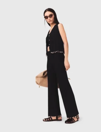 Pantalon en maille ornée de bijoux
